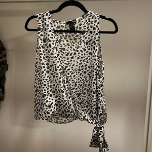 Aqua black and white cheetah printed flowy top with tie at the bottom. Size L.